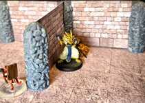 Dry brushed aggregate pillars with dungeon walls